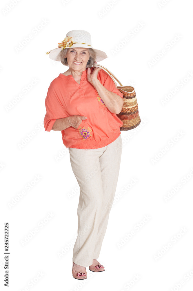 Beautiful senior woman in hat on white background Beautiful senior woman in hat on white background