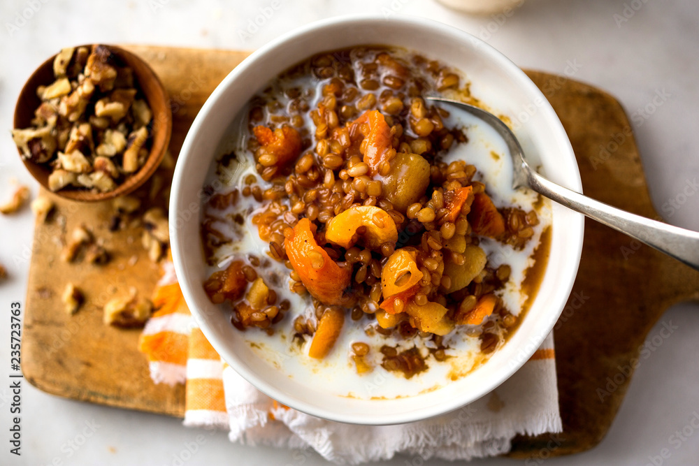 Overhead view of cereal breakfast on cutting board Overhead view of cereal breakfast on cutting board
