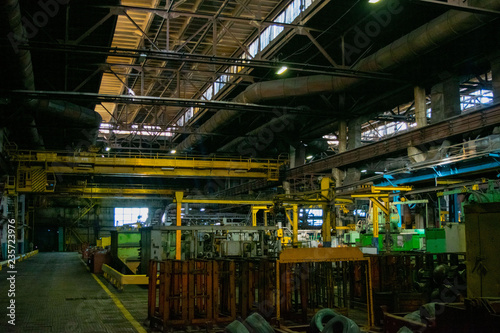 Production machines, equipment and heavy iron stamping in the industrial shop forge plant. Manufacture of auto parts