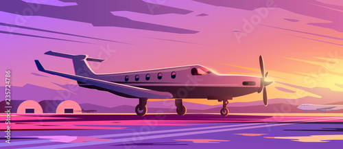 A standing plane. Travel by airplane. Sunset.