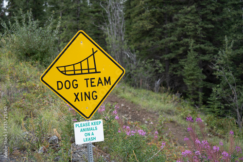 Dog Team Xing - Dog Sled team crossing road sign in Alaska
