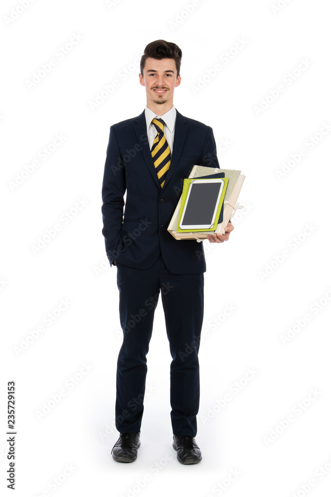 businessman standing in the studio with tablet and documents in his arms, she is wearing a black suit and white shirt businessman standing in the studio with tablet and documents in his arms, she is wearing a black suit and white shirt