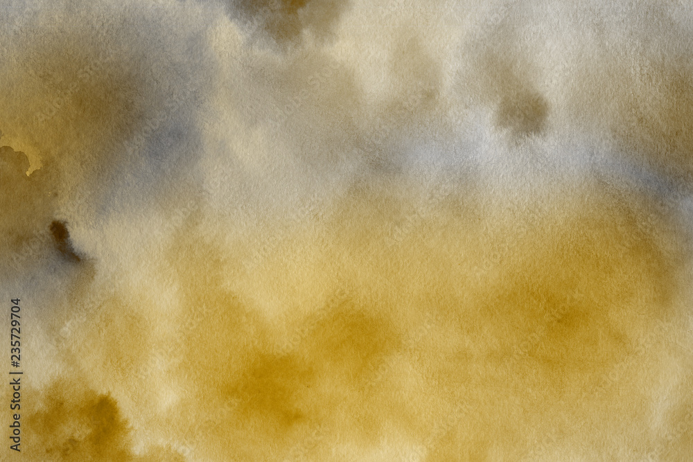 Gold watercolor texture with abstract washes and brush strokes on the white paper background. Gold watercolor texture with abstract washes and brush strokes on the white paper background.
