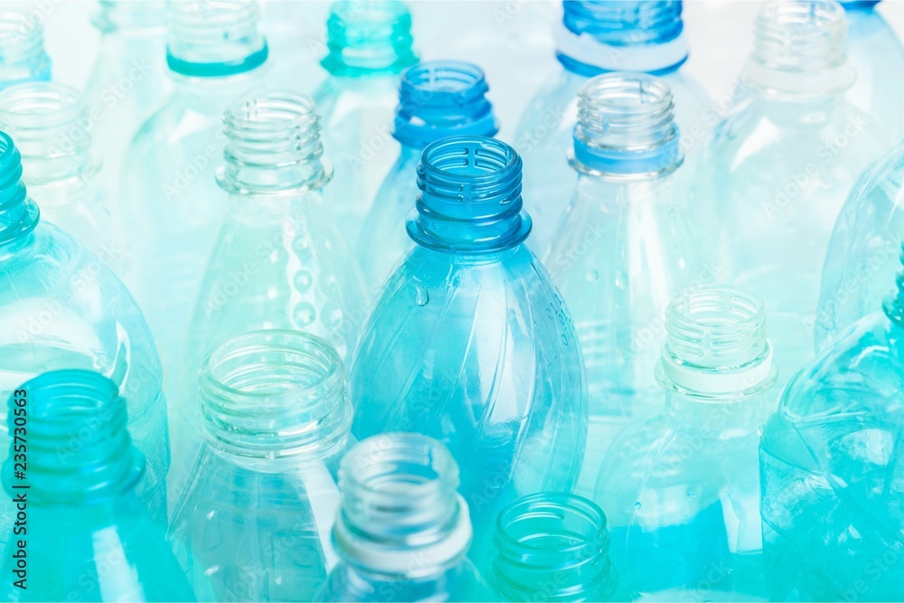 Plastic bottles of water isolated on background Plastic bottles of water isolated on background