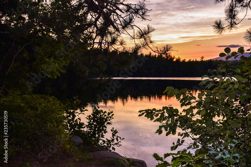 Sunset over the Winnipesaukee lake. Summer landscape in New Hampshire, USA