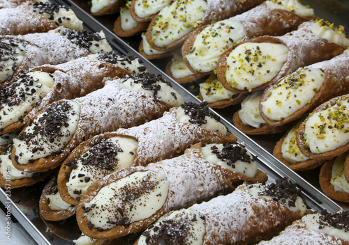 typical Sicilian cannoli stuffed with ricotta