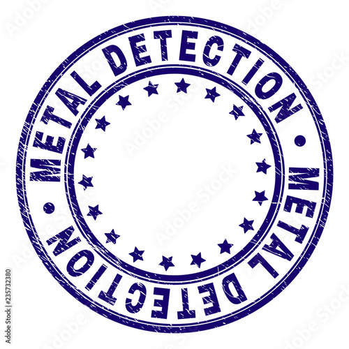 METAL DETECTION stamp seal imprint with grunge texture. Designed with circles and stars. Blue vector rubber print of METAL DETECTION tag with retro texture.