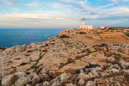 Sunset in Cavalleria Lighthouse on Minorca Island northern shore, Balearic Islands, Spain.