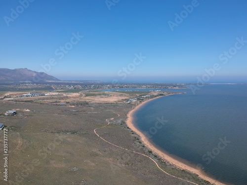 Aerial drone shot of a lagoon bank