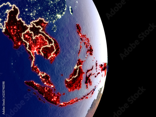 Satellite view of ASEAN memeber states at night with visible bright city lights. Extremely fine detail of the plastic planet surface. photo