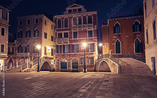 Night view from Venice a couple sitting under street light