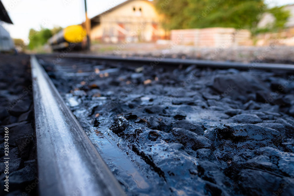 Stones Get Dirty Oil on Railway