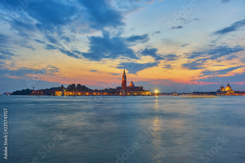 Scenic view of St George Church and Island in the Giudecca Canal, as seen at night from St Mark's district in Venice