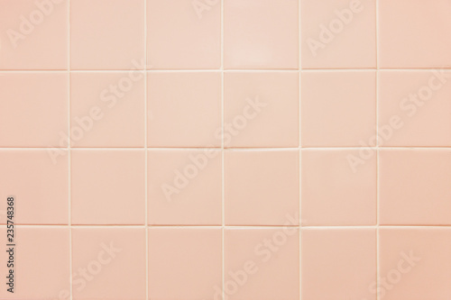 Texture of pink tile. Light pink tile background