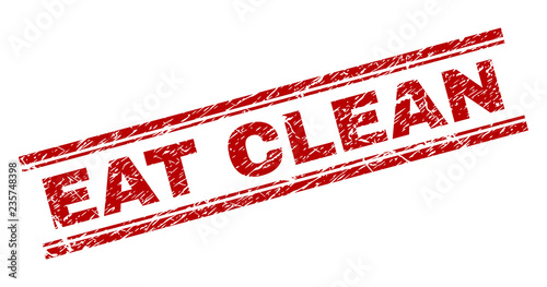 EAT CLEAN seal print with distress effect. Red vector rubber print of EAT CLEAN text with unclean texture. Text tag is placed between double parallel lines.