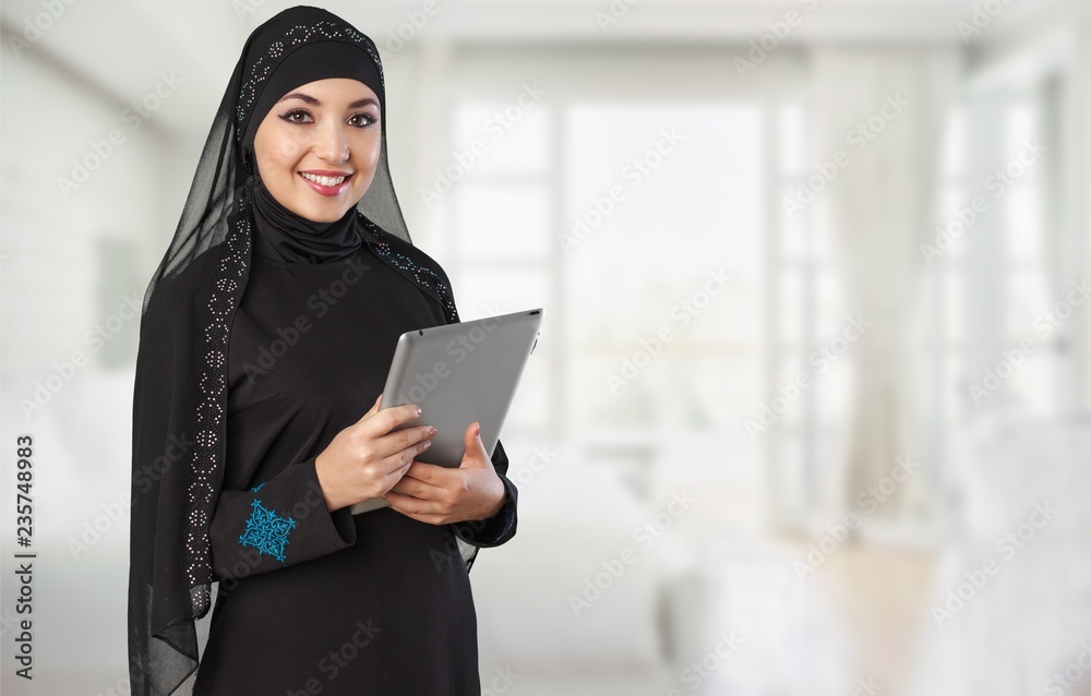 Close-up Beautiful Young Muslim Woman on blurred background Close-up Beautiful Young Muslim Woman on blurred background