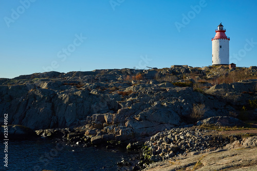 Lighthouse in Swedish village Landsort on the island of Oja photo