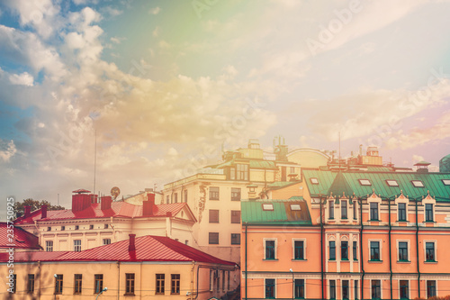 multi-colored roofs of old multi-storey buildings in St. Petersburg.warm toning on the image