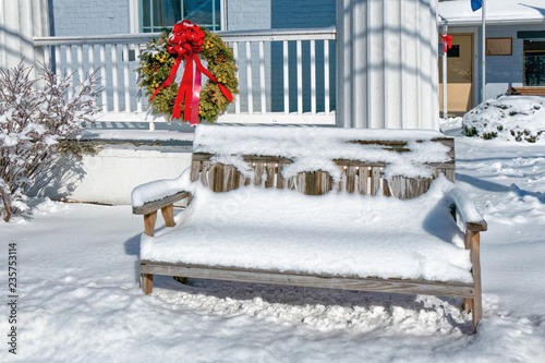 Snow Covered Bench on Winter Day