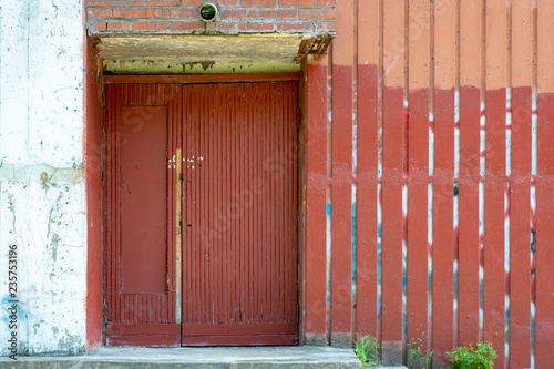 Old poor door of an East European apartment building