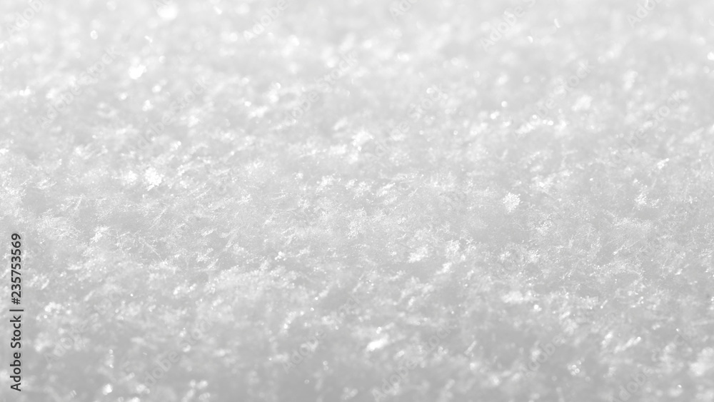 White shiny natural background, template for new year greeting card. Snow texture with snowflakes on a sunny winter day, wallpaper for the holiday. White shiny natural background, template for new year greeting card. Snow texture with snowflakes on a sunny winter day, wallpaper for the holiday.