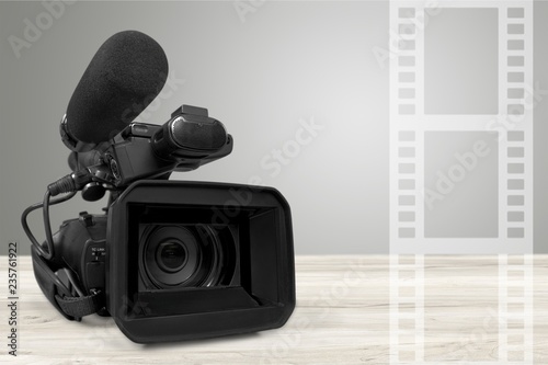 Professional video camera  on white background photo