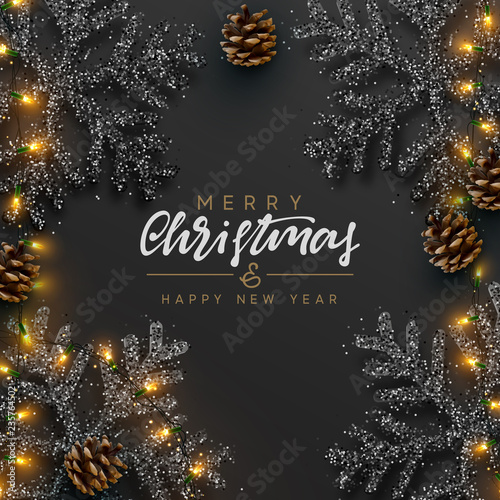 Christmas Background. Xmas design of sparkling realistic lights garland, black snowflake and glitter gold. Christmas banner, greeting cards, headers, poster website. Stylish black pattern