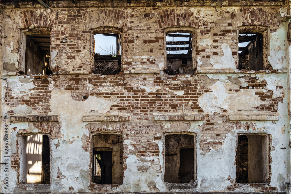 Brick wall with window openings of old abandoned dilapidated historical ...