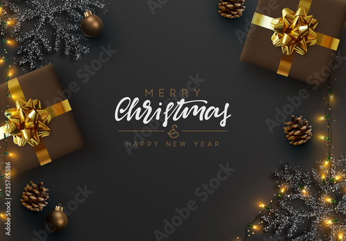 Christmas banner. Background Xmas design of sparkling lights garland, realistic gifts box, black snowflake and glitter gold. Christmas poster, greeting cards, headers, website. Stylish black pattern