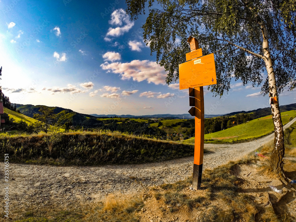 Sign Post in Beskids Mountains. Mikolaska Village, Rytro, Poland.