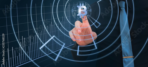 businessman pointing finger on the bitcoin digital cryptocurrency with stock market chart © Starmarpro