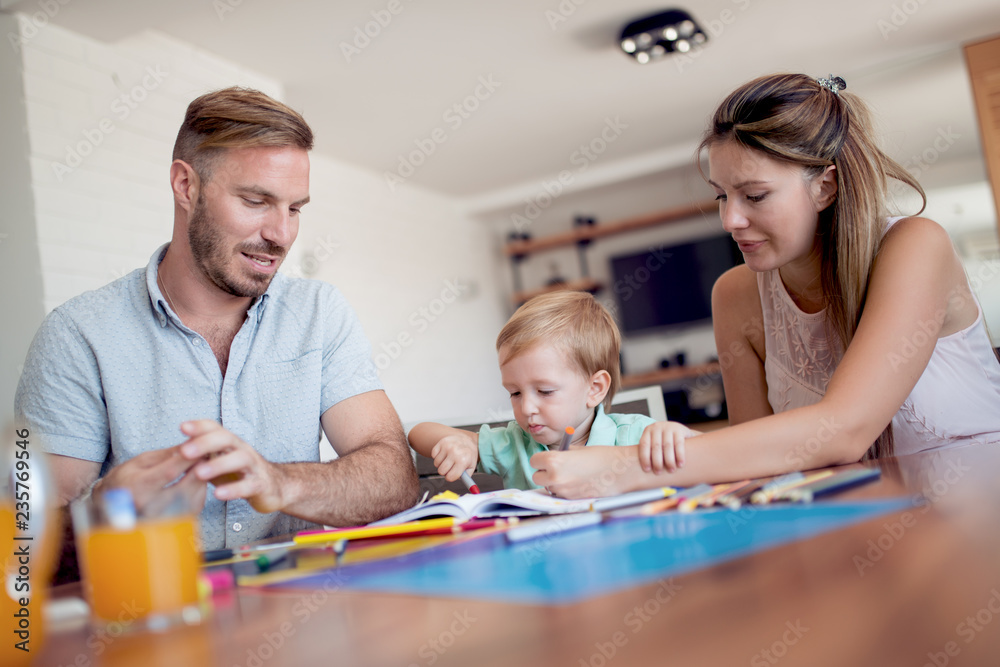Fototapeta premium Parents draw with a little son
