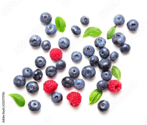 blueberries with raspberries isolated on white bacgkround