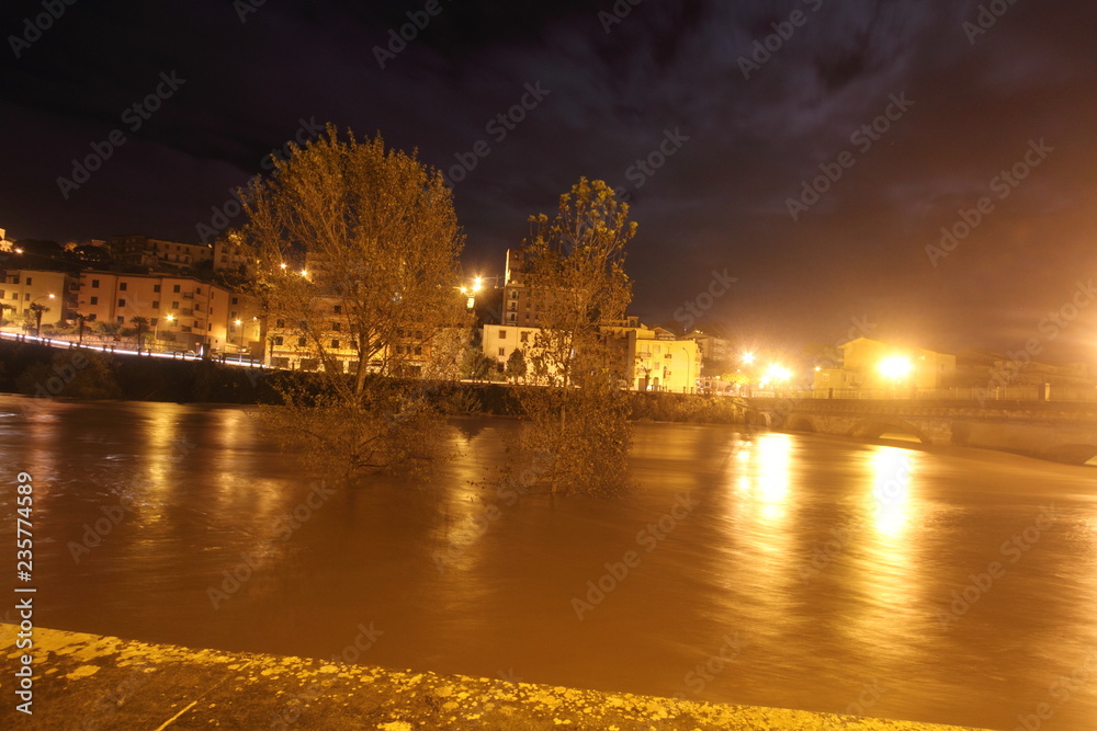 Naklejka premium Pontecorvo, Italy - November 23, 2018: The flood of the river Liri after heavy rains