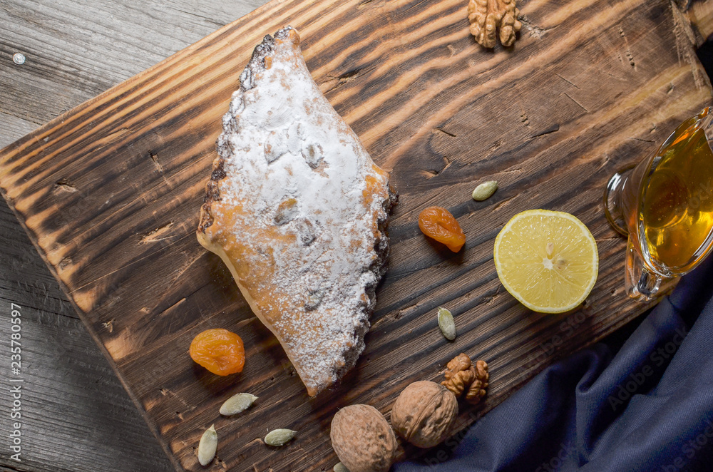 Arabic Sweet , wooden background board. Top view. Arabic Sweet , wooden background board. Top view.