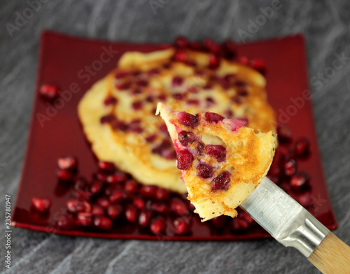 aus omas küche, pfannenkuchen mit moosbeere photo