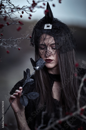 Widow with black rose