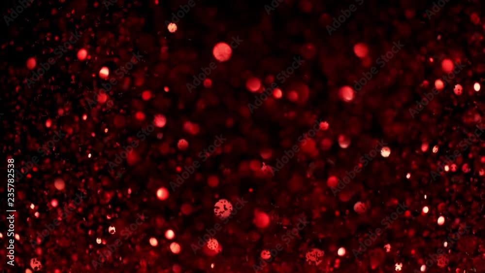 Red glitter explosion in super slow motion shooted with high speed cinema camera.