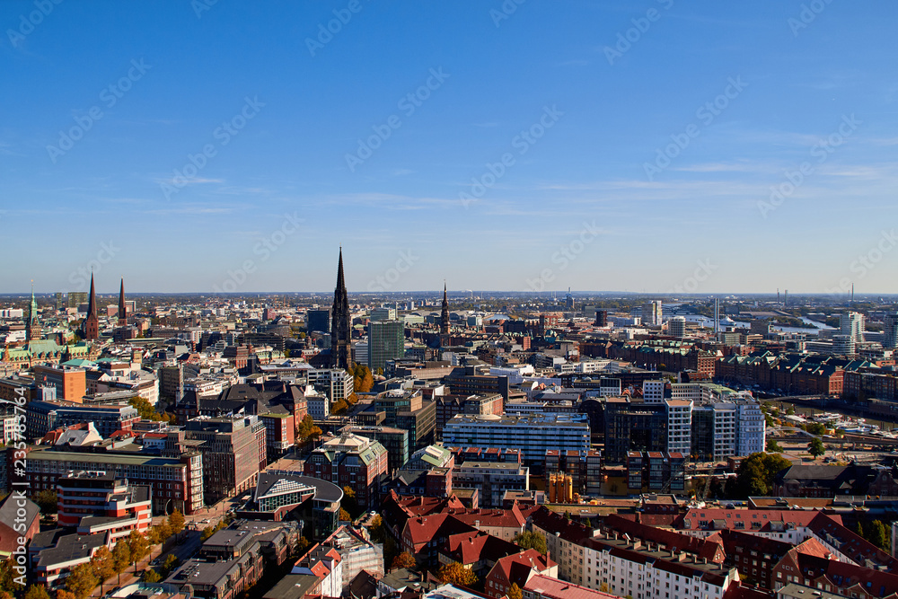 Naklejka premium City streets of Germany. Panoramic view of the city of Hamburg from a height. Photo of Hamburg from a height. Cityscape houses and streets.