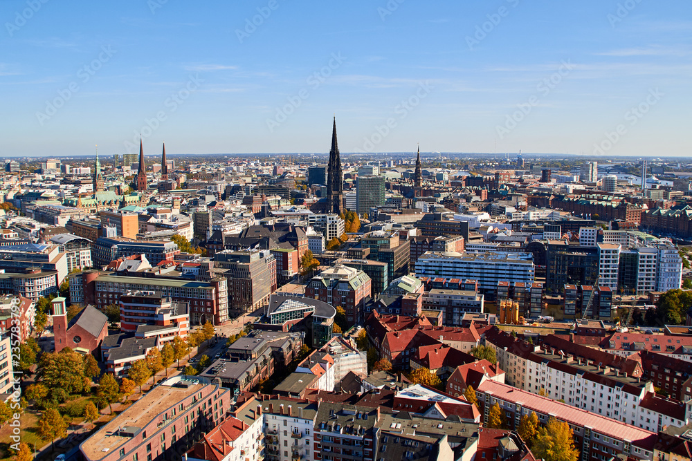 Obraz premium City streets of Germany. Panoramic view of the city of Hamburg from a height. Photo of Hamburg from a height. Cityscape houses and streets.