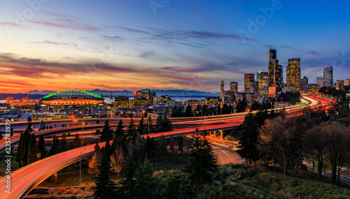 Seattle downtown skyline panorama at sunset from Dr. Jose Rizal or 12th Avenue South Bridge with traffic trail lights © SvetlanaSF