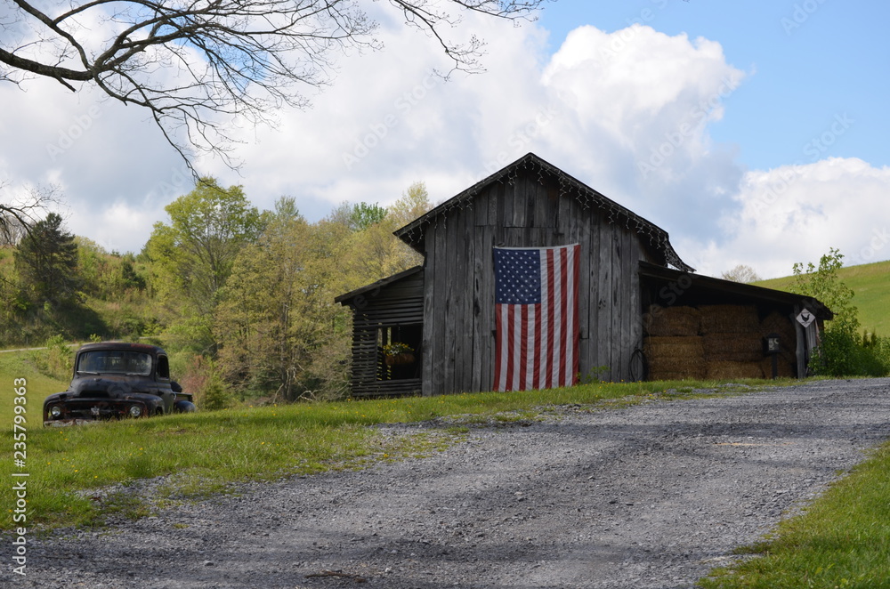 old barn in field