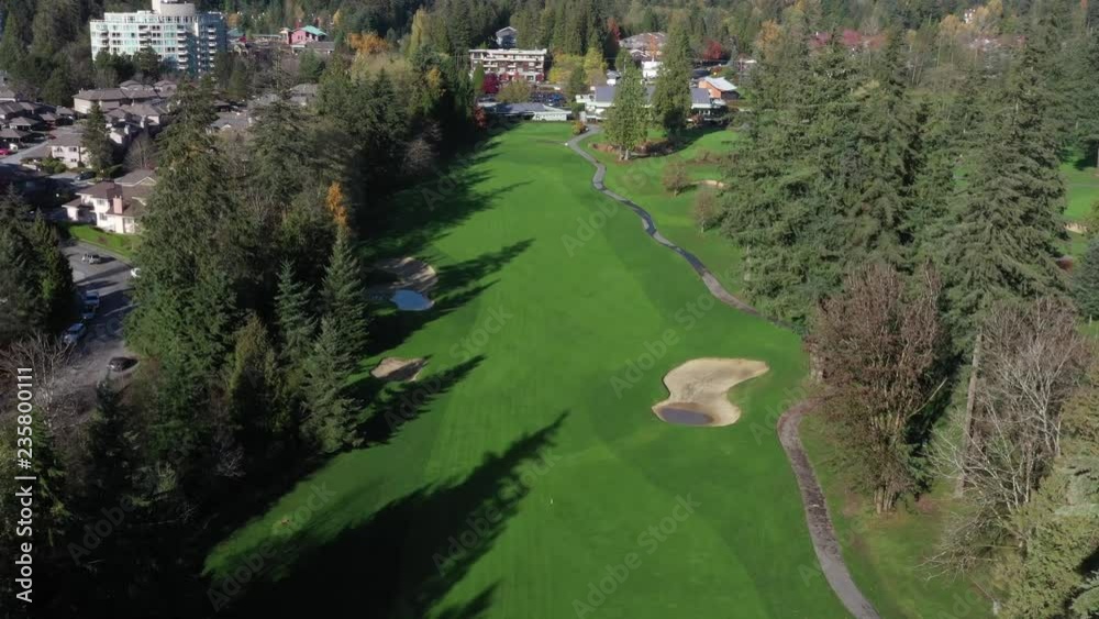 Golf course with gorgeous green and fantastic forest view. Aerial. 4k. Golf course with gorgeous green and fantastic forest view. Aerial. 4k.