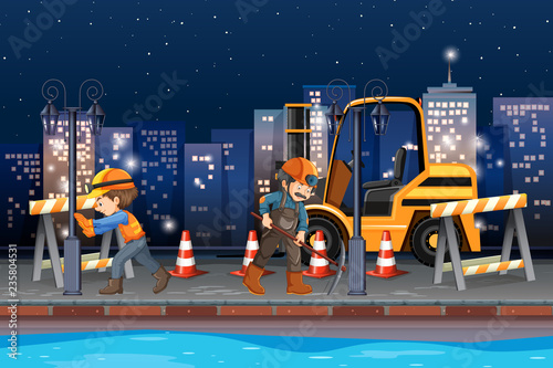 Construction worker working at night