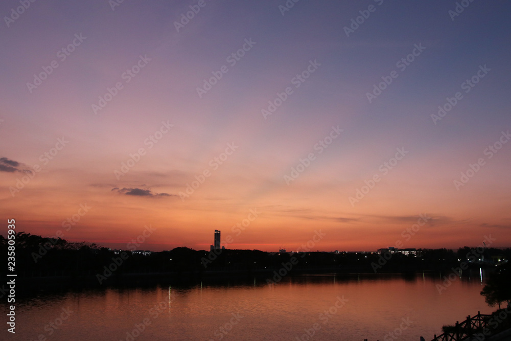 Silhouette twilight with lake reflection on water surface landscape background