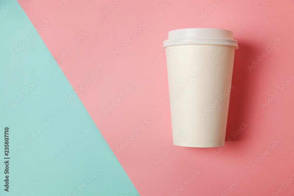 Simply flat lay design paper coffee cup on blue pink pastel colorful trendy background. Takeaway drink container. Good morning wake up awake concept. Template of drink mockup. Top view copy space Simply flat lay design paper coffee cup on blue pink pastel colorful trendy background. Takeaway drink container. Good morning wake up awake concept. Template of drink mockup. Top view copy space