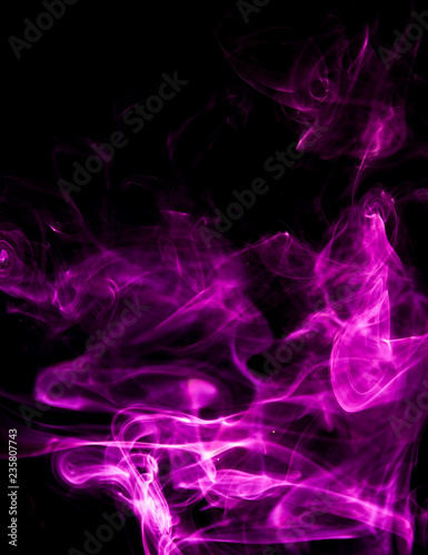 Purple smoke on black background