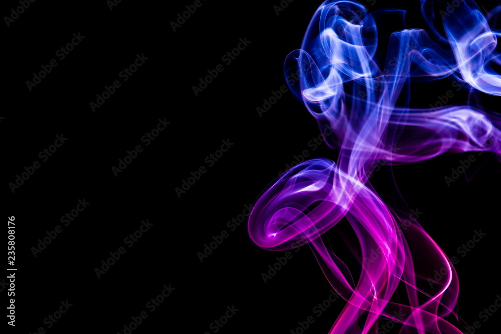 Colored smoke on black background Colored smoke on black background