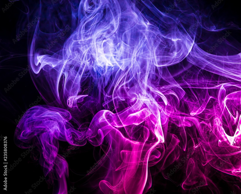 Fototapeta premium Colored smoke on black background