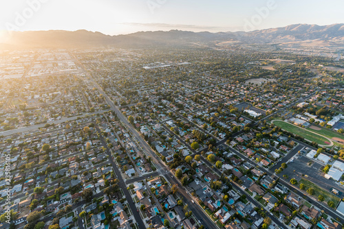 Late afternoon aerial view towards Lassen St and Corbin Ave in the San Fernando Valley Chatsworth neighborhood of Los Angeles, California.
